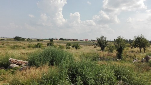 Teren intravilan 30900 mp  sat