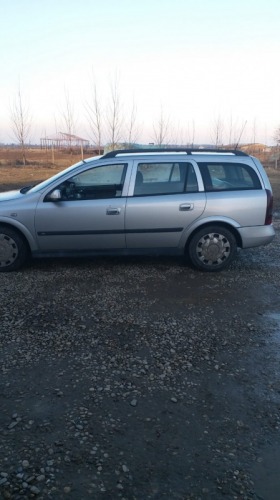 Vand  Opel Astra G Caravan mot